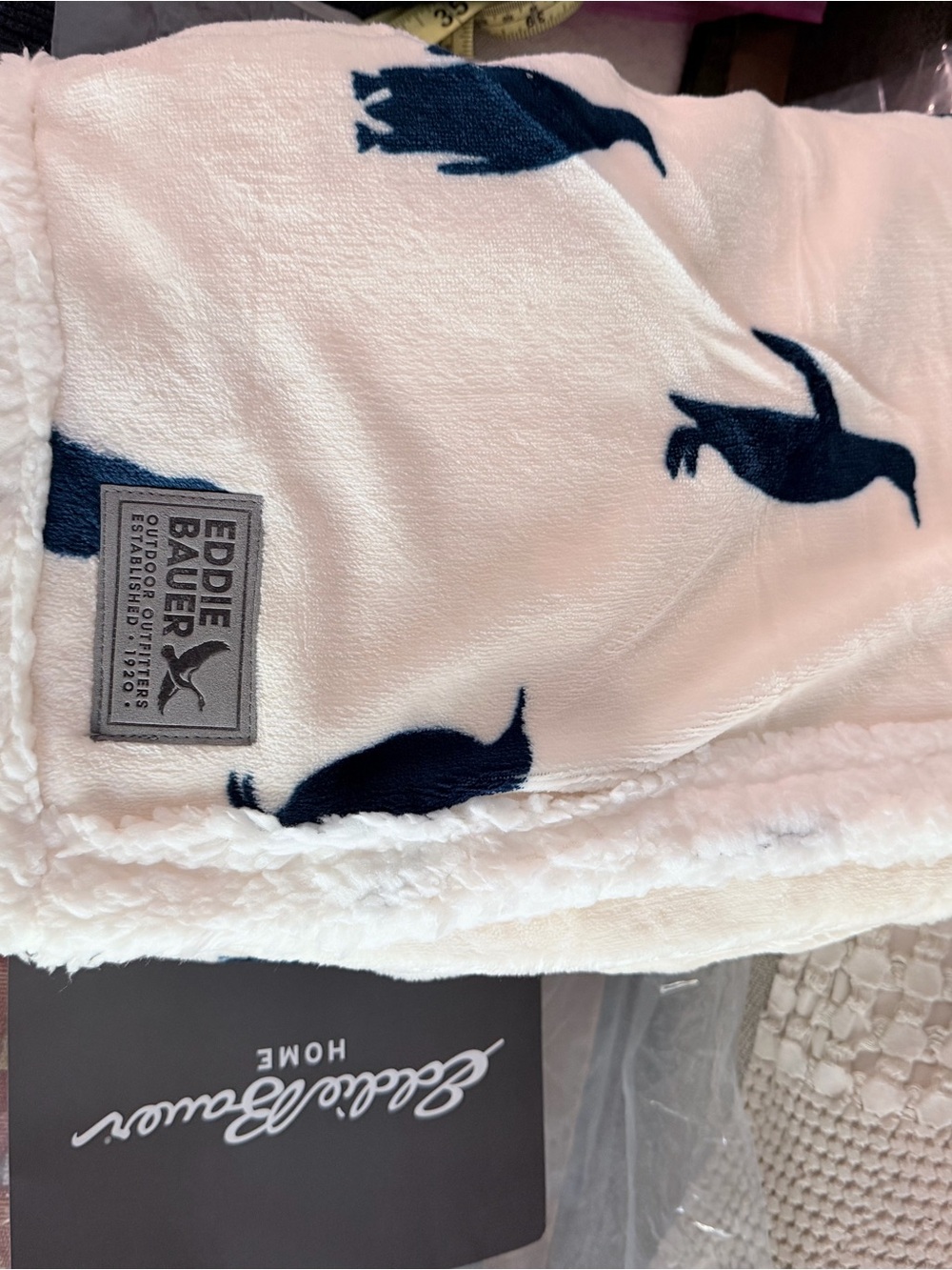 Eddie Bauer White Plush Throw with Navy Penguin Print